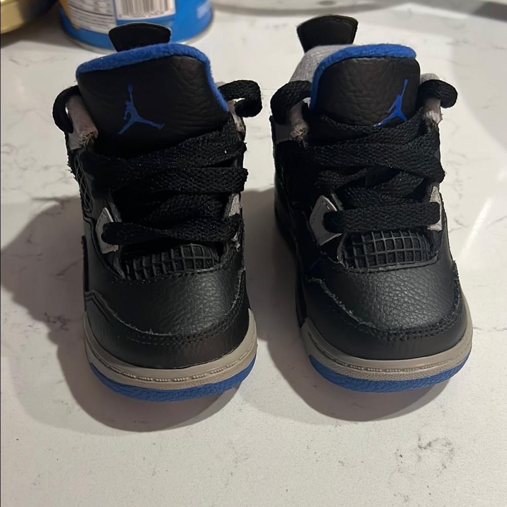 SOLD ‼️Jordan Kids Black and Blue Sneakers